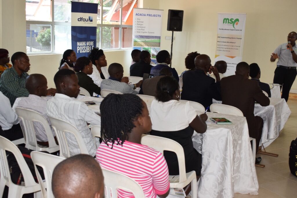 MSC's James Muhwezi facilitating a session during a Joint MSC-DFCU client training